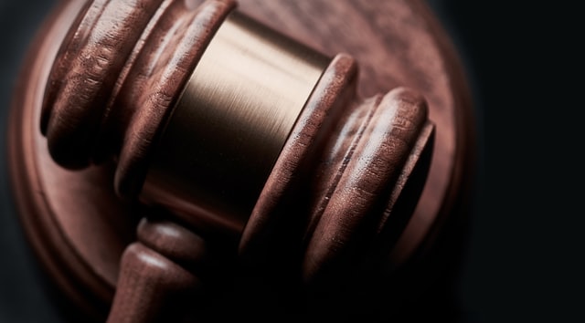 a%20brown%20wooden%20judges%20gavel a%20brown%20wooden%20judges%20gavel